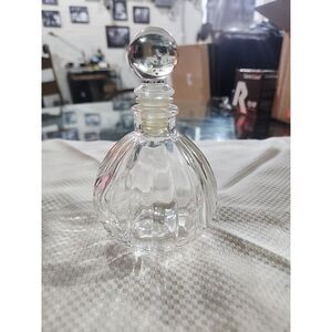 This little Blown glass decanter shaped bottle is a perfume refill bottle. It is